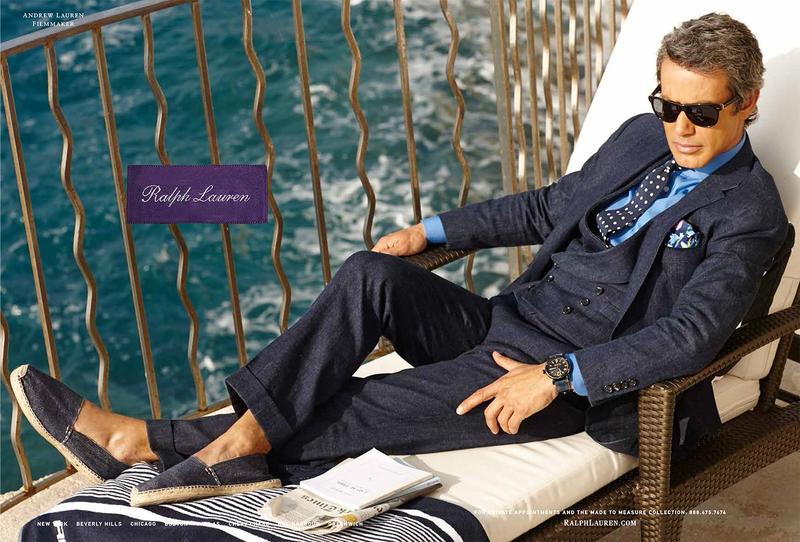 Andrew Lauren lounges in a three-piece suit with espadrilles. 