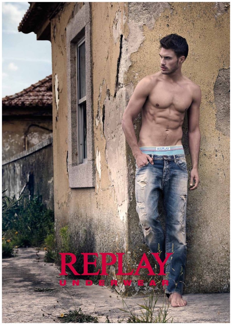 Jabel Balbuena rocks a pair of distressed Replay jeans with the waistband of the label's underwear poking out.