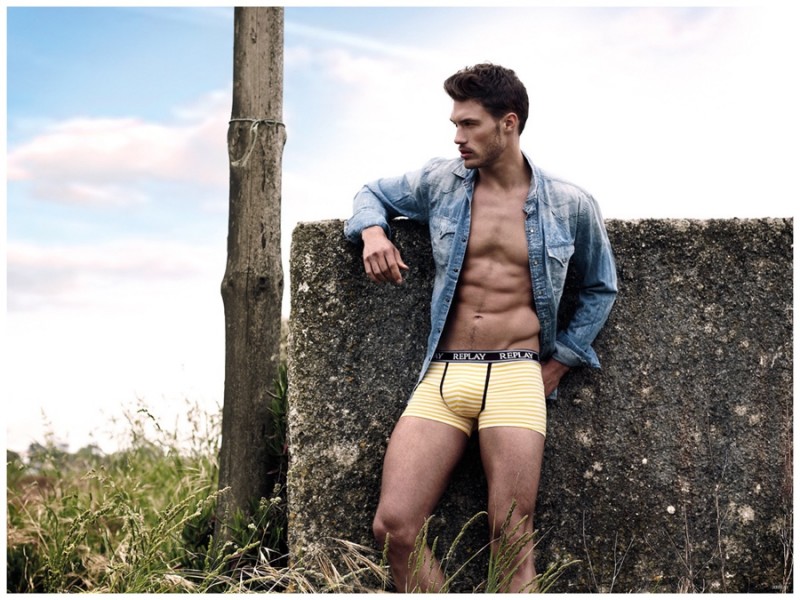 Yellow is the color as Jabel Balbuena sports underwear briefs with a denim shirt.