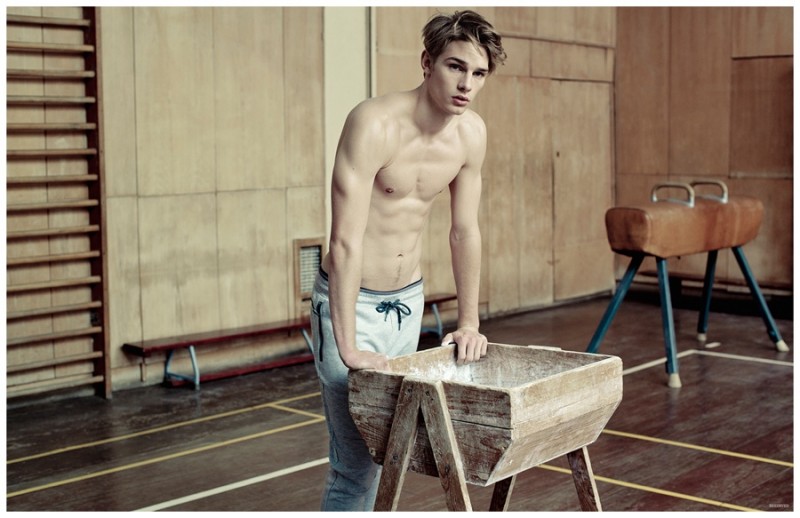 Sporting joggers, Tommy Marr prepares for the pommel horse.