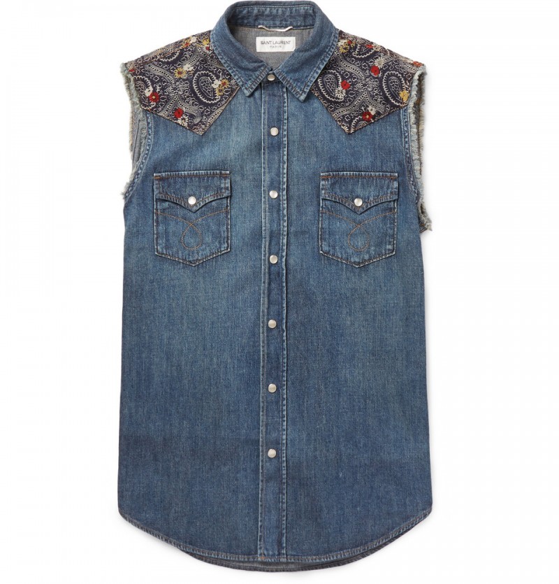 Denim Trend Pick: Saint Laurent offers up a trim denim vest accented with a bandana print along the shoulders. The unique piece fits in with Saint Laurent creative director Hedi Slimane's western themed spring collection. Available at MrPorter.com.