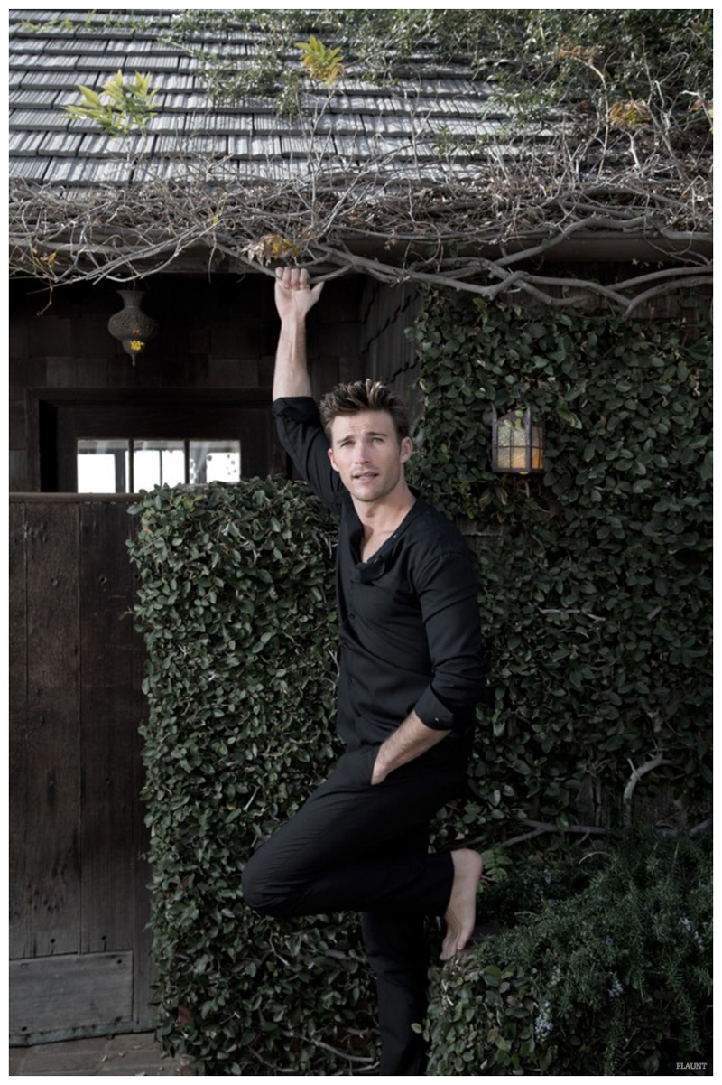 Scott Eastwood sports a black ensemble featuring a shirt from Marni with Maison Martin Margiela pants.