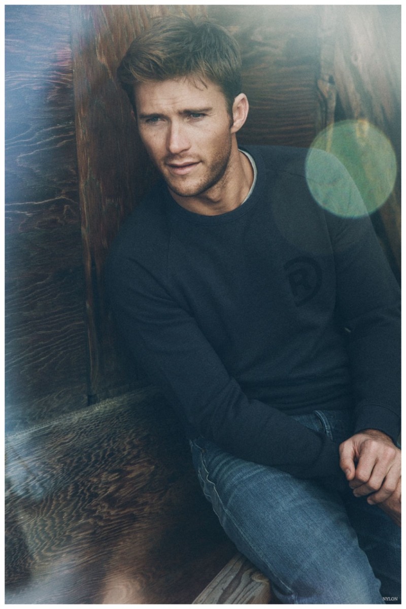 Scott Eastwood relaxes in jeans for a casual photo.