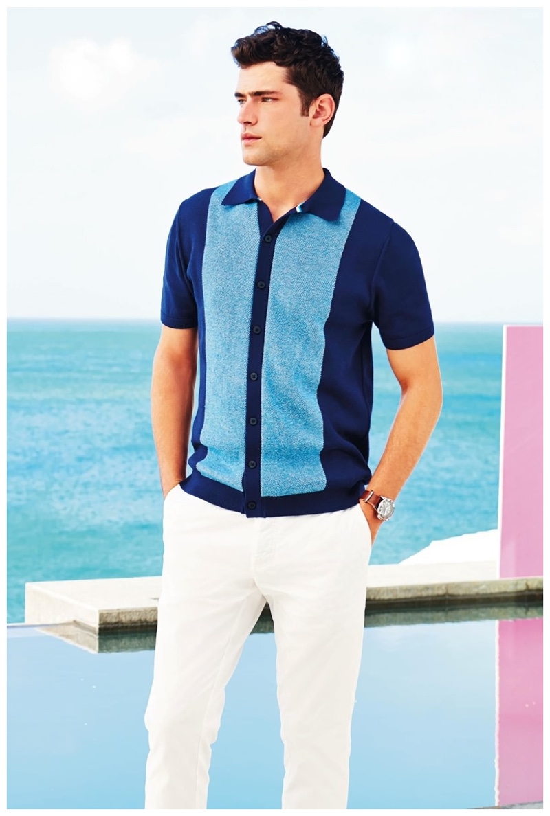 Channeling the 1950s, Sean O'Pry wears a color block short-sleeve shirt.