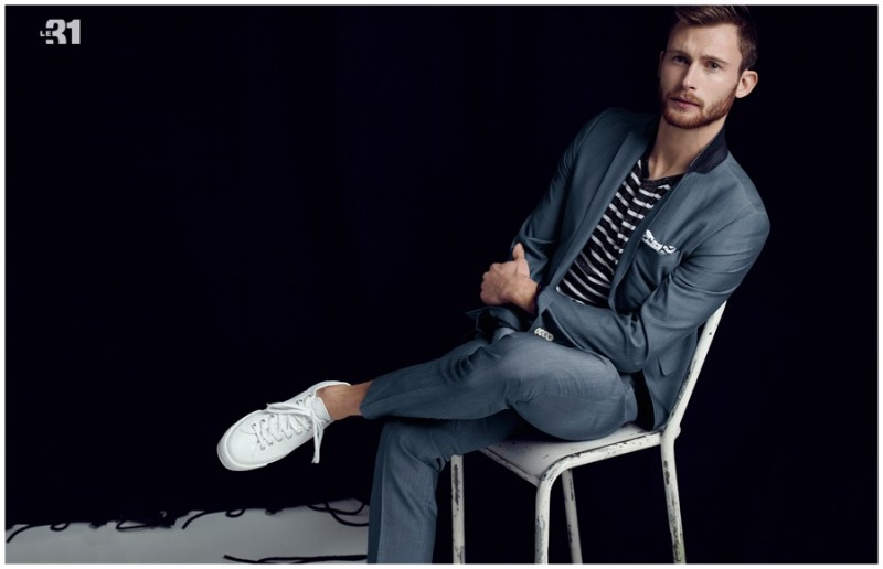 Model Sebastian Lund sports a smart shirt and tie ensemble from Simons' Captain Club lookbook.