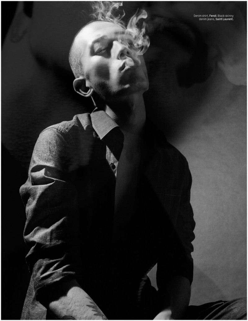 Sung Jin Park takes in a dramatic smoke.