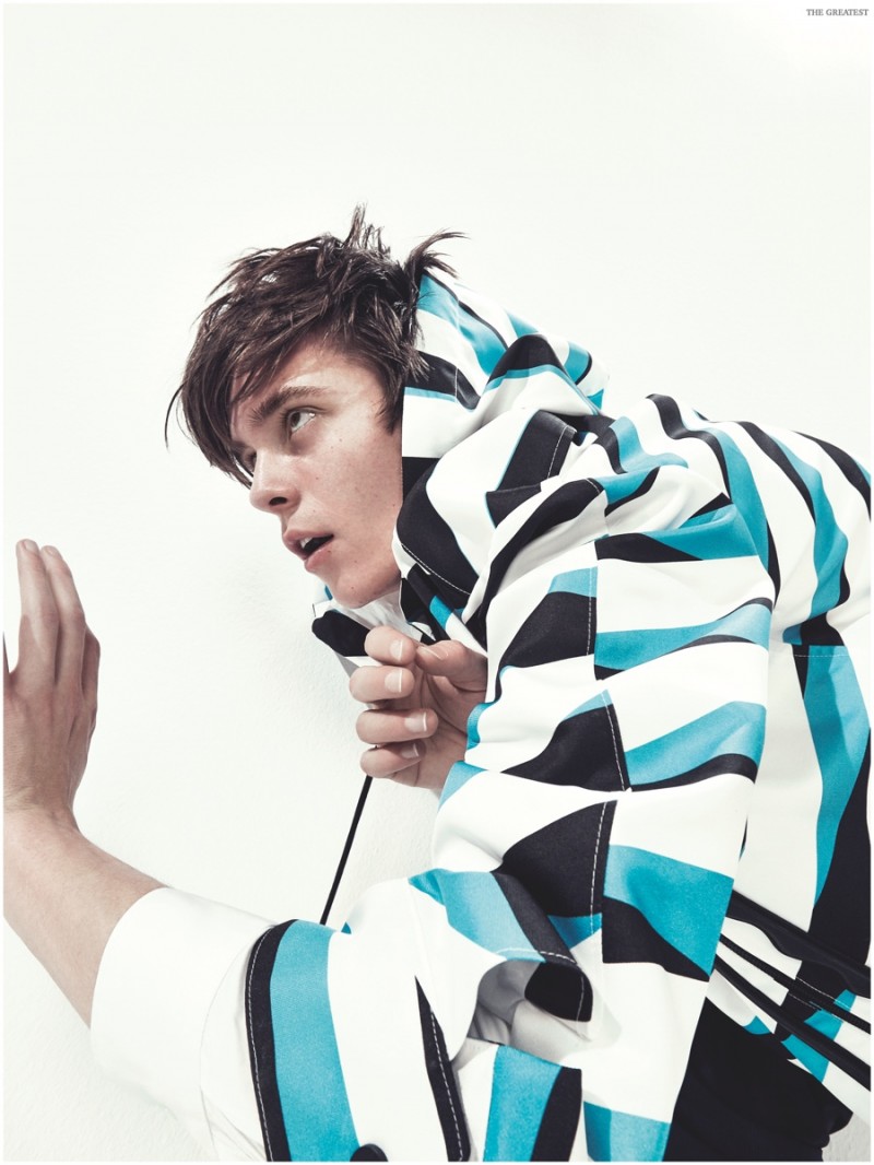 Gustaaf Wassink models a colorful, printed jacket from French fashion brand Kenzo.