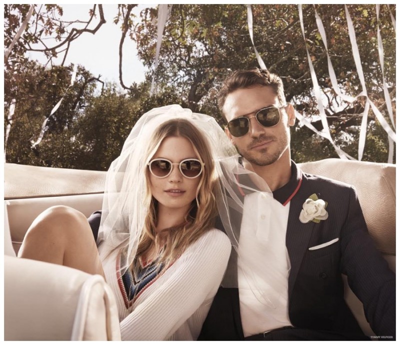 Arthur Kulkov is in bridal bliss as he rocks sunglasses for Tommy Hilfiger.