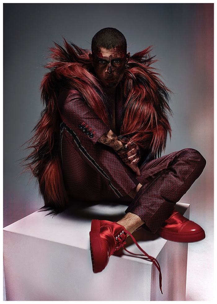 Seeing Red: Micky Ayoub dons a deep red suit with over the top accessories.