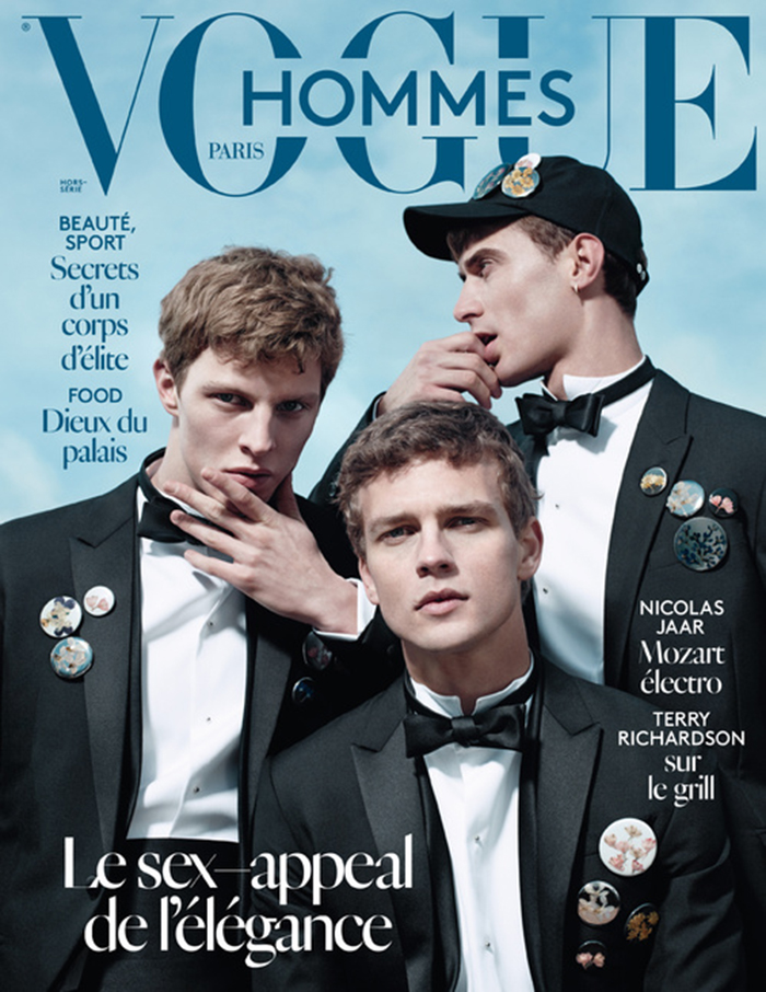 Pictured left to right: Models Tim Schumacher, Benjamin Eidem and Clément Chabernaud don tuxedos for the unusual spring-summer 2015 cover of Vogue Hommes Paris.