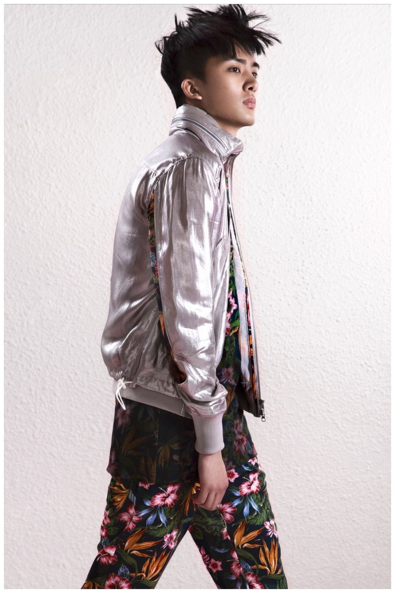 Sheng Huang embraces Y-3's metallic silver edge in a statement jacket.