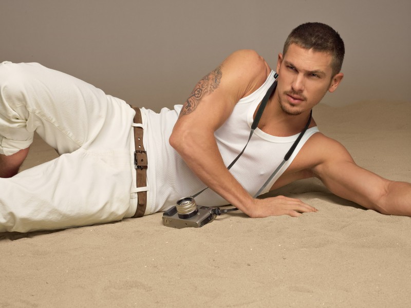 Adam Senn poses in a tank for Dolce & Gabbana's spring-summer 2012 lookbook.