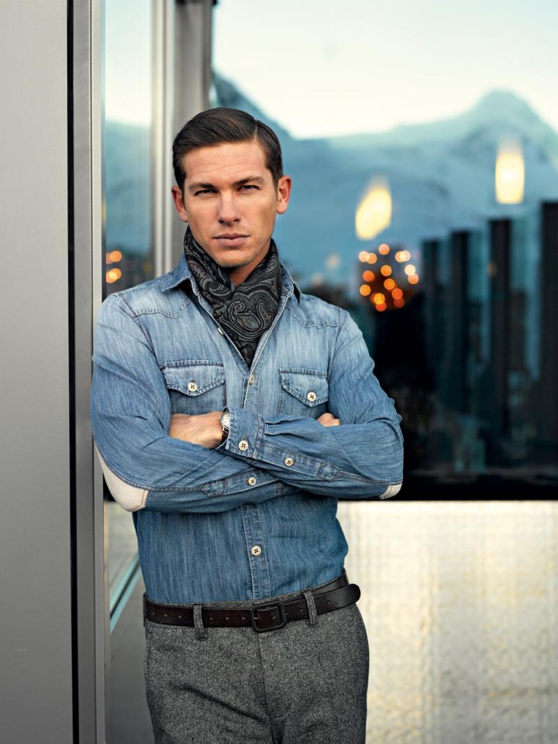 Sporting a distressed denim shirt, Adam Senn stars in a fall-winter 2012 lookbook for Pierre Cardin.