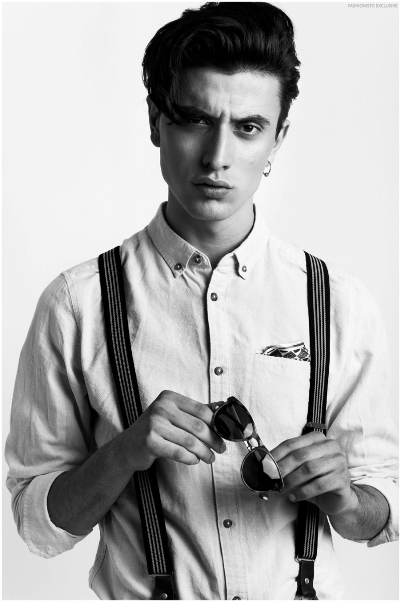 Adrian wears suspenders Antony Morato, shirt United Colors of Benetton and sunglasses Armand Basi.