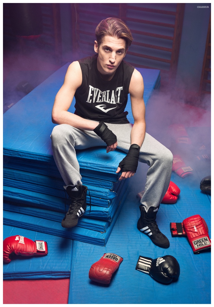 Anatol Modzelewski poses in a black sleeveless Everlast top with Adidas shoes.