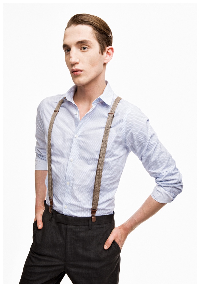 Embracing a smart, simple style, Anatol Modzelewski sports thin suspenders.