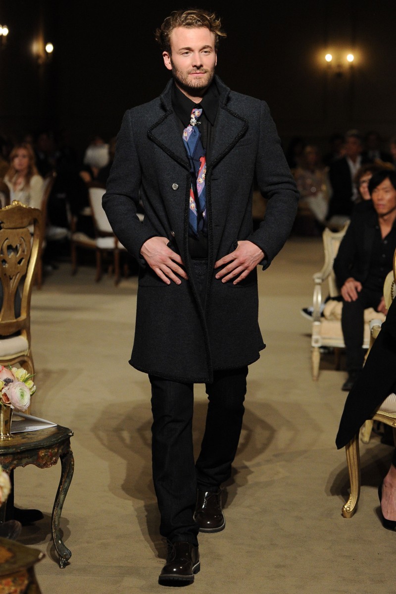 Brad Kroenig hits the catwalk in a tailored coat.