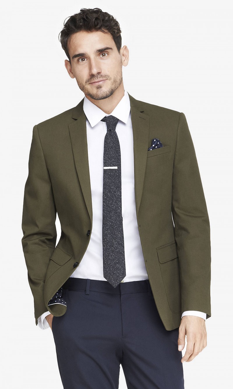 Arthur Kulkov wears Express Olive Green Twill Blazer