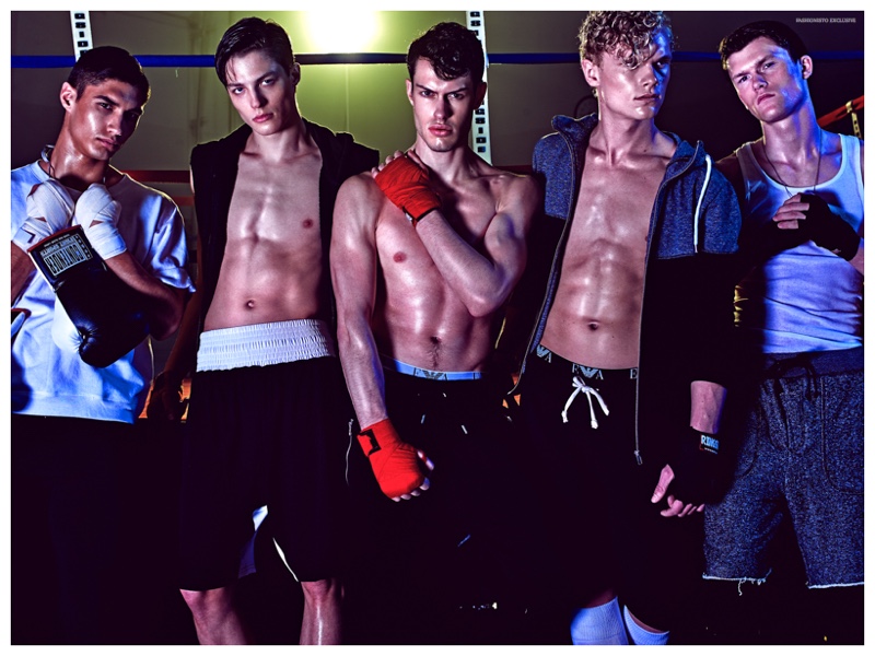 Left to Right: Brydon wears sweatshirt Hanes, tights Everlast and gloves Ringside. Brodie wears hoodie T by Alexander Wang and shorts stylist’s own. Angus wears sweatpants H&M and briefs Emporio Armani. Erik wears two­-tone zip hoodie H&M, shorts Alternative Apparel, briefs Emporio Armani and socks Adidas. Riley wears tank top Hanes, shorts BDG, socks American Apparel, toque H&M and necklace model’s own.