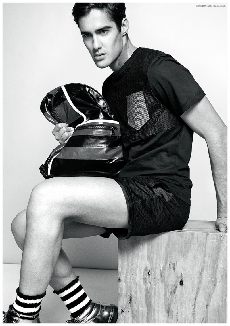 Julio wears backpack Emporio Armani, socks Salvatore Ferragamo, shoes Jimmy Choo, t-shirt and shorts Antony Morato.