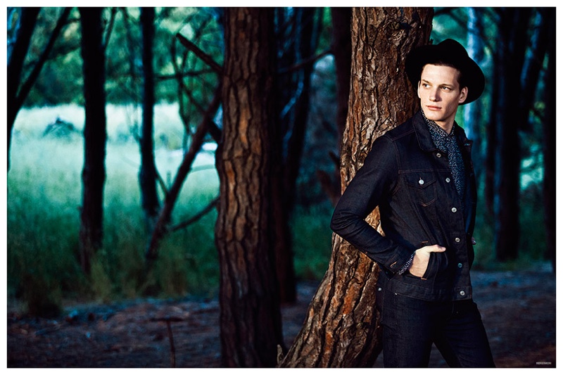 Florian Van Bael is confident in a denim jacket, skinny jeans and a black fedora.