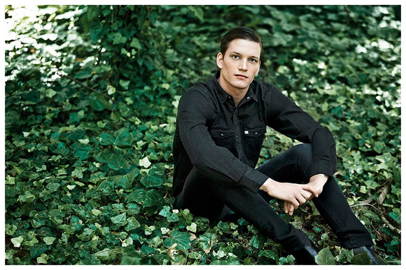 Doubling down on denim, Florian Van Bael trades in his denim jacket for a dark denim shirt.