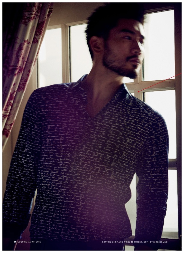 Godfrey Gao wears Dior Homme's recognizable calligraphy print.