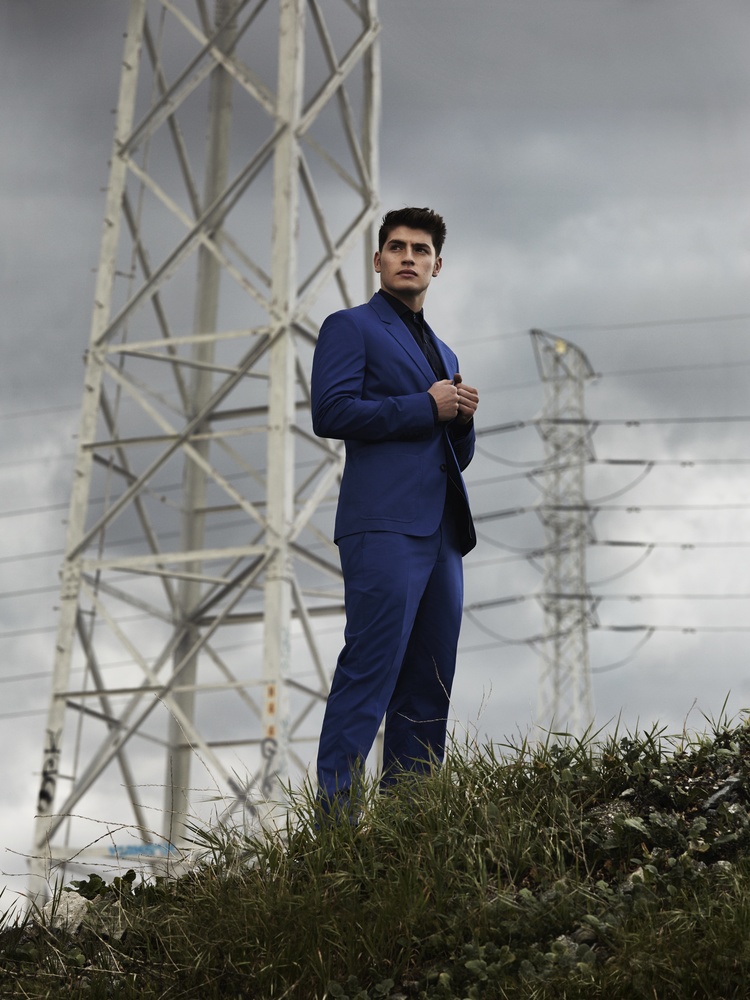 Gregg Sulkin wears suit Marc by Marc Jacobs and shirt Ralph Lauren.