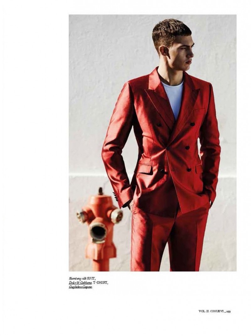 Alessio Pozzi dons a red Dolce & Gabbana suit.