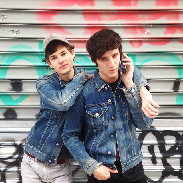 Embracing denim together, Jarlos (Carlos Santolalla and John Tuite) are photographed in denim jackets.
