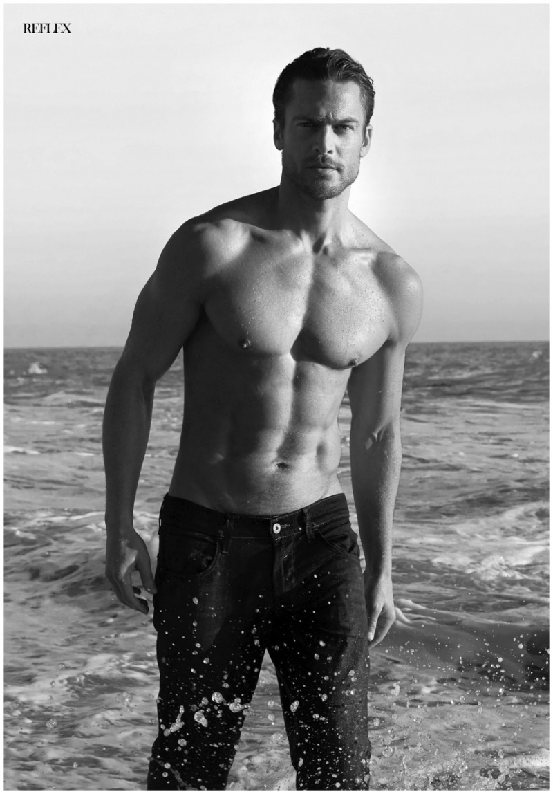 A shirtless Jason Morgan is captured in a black & white photo.