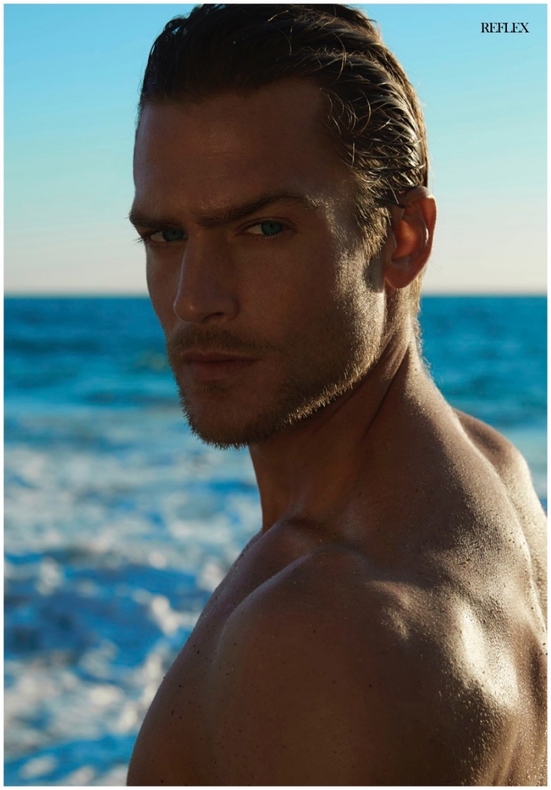 A sunkissed photo of Jason channels the mood of his Giorgio Armani fragrance campaign.