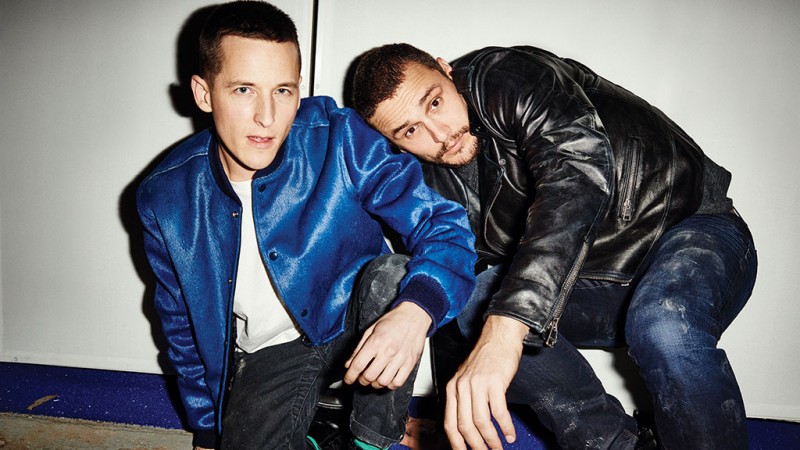 Wearing Levi's jeans with a jacket and shirt by Anzevino Getty, I Am Michael director Justin Kelly poses for a photo with a Gucci clad James Franco.