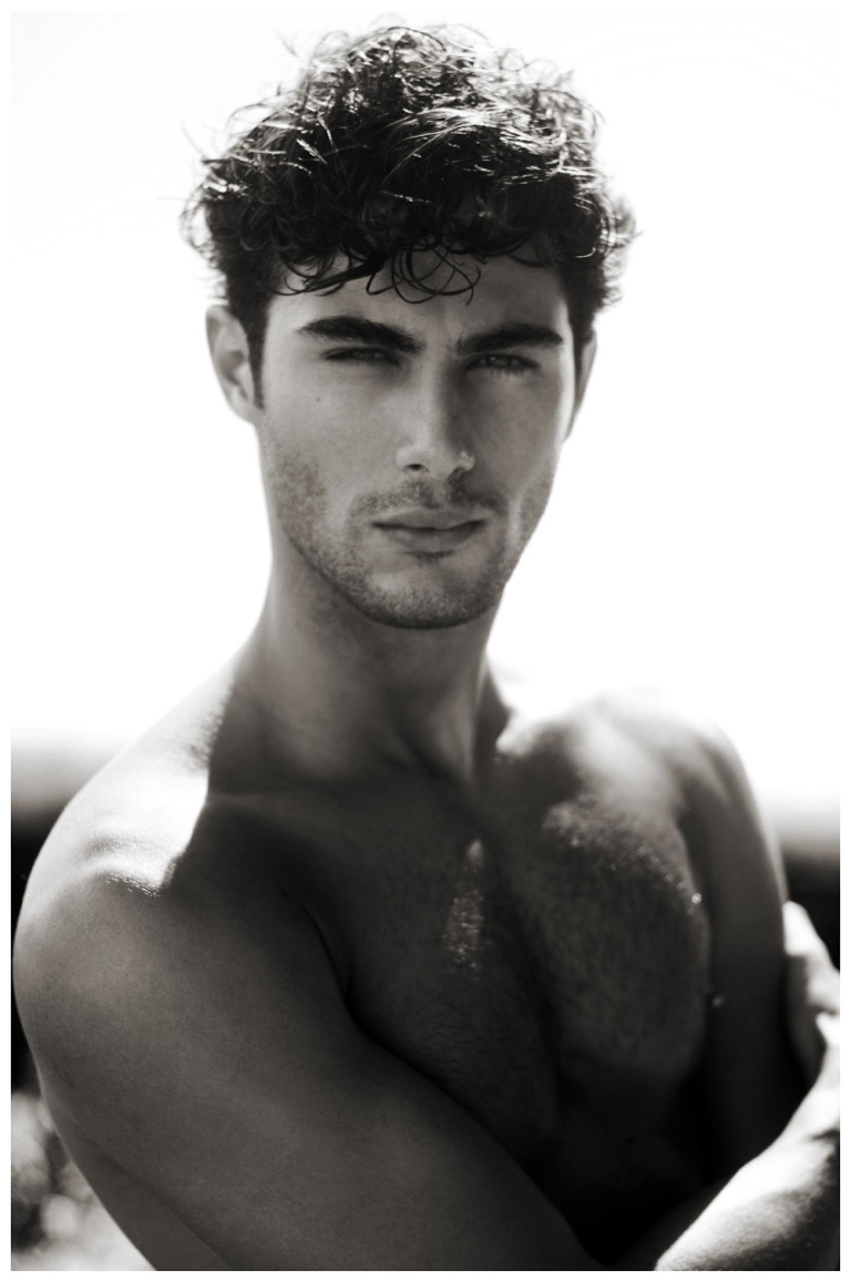 Lucas Alves captured in a black & white portrait.