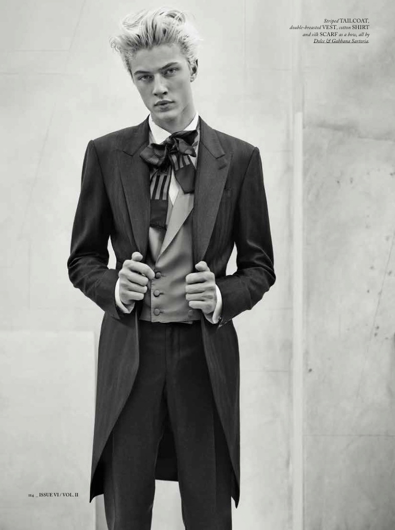 Lucky Blue Smith is dandy in a long slender coat.