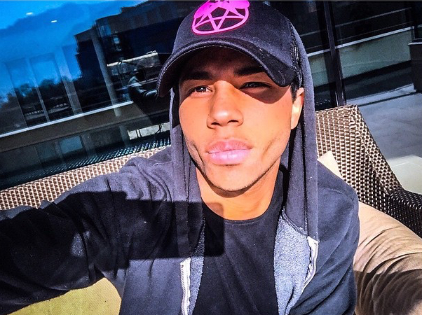 Olivier Rousteing is sporty as he poses for a selfie in a hoodie and cap.