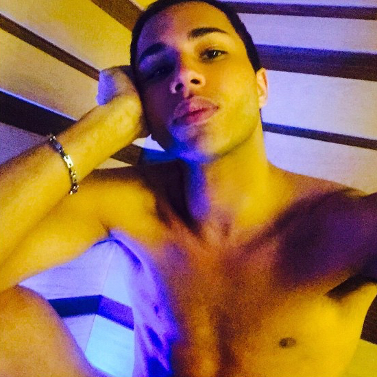 A shirtless Olivier Rousteing shares a relaxing moment.