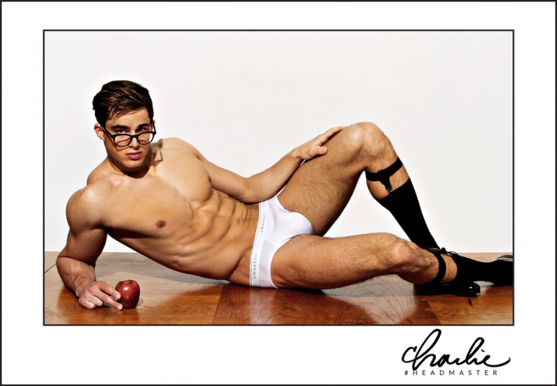 Pietro Boselli plays to the cheeky image of a teacher as he poses across a desk with an apple.