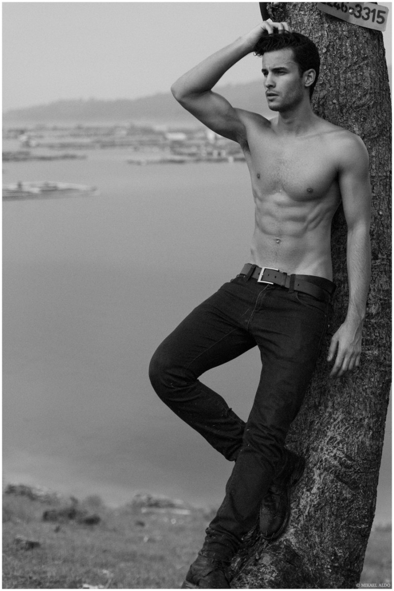 Posing shirtless, Renato Freitas is captured in a black pair of skinny jeans.