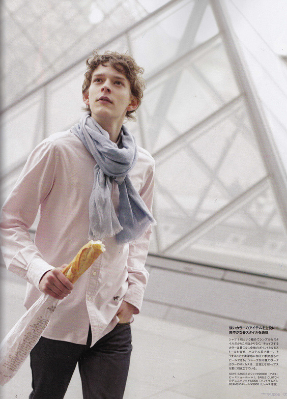 Robert carries a baguette as he models a choice way to wear summer scarves.