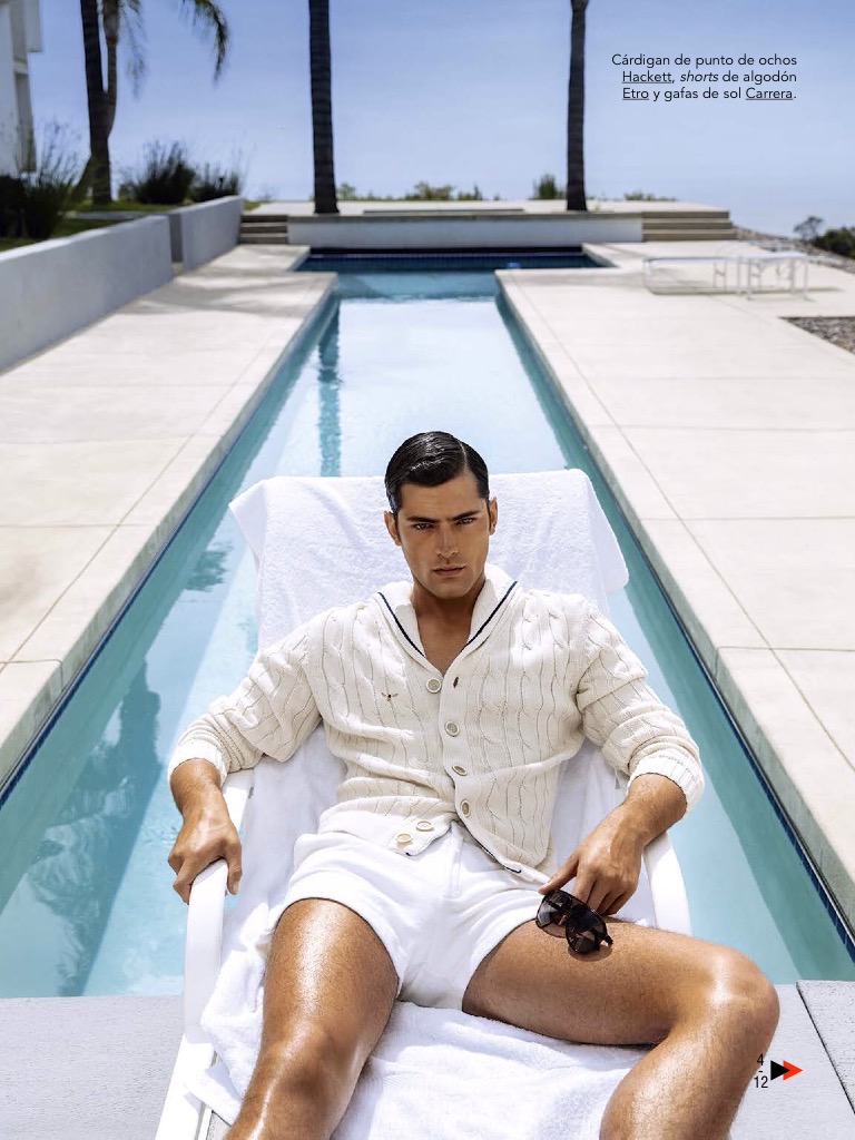 Sean O'Pry is a luxe vision in a light summer look featuring a HAckett knit cardigan and Etro shorts.