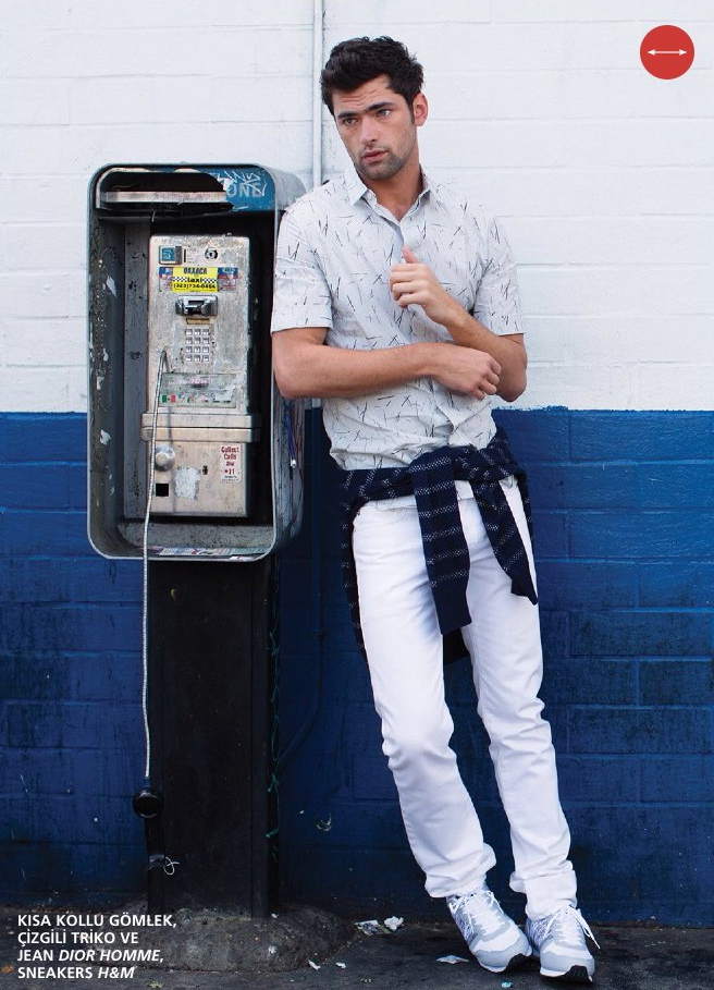 Sean O'Pry prepares for summer in a light colored outfit from Dior Homme, paired with H&M shoes.