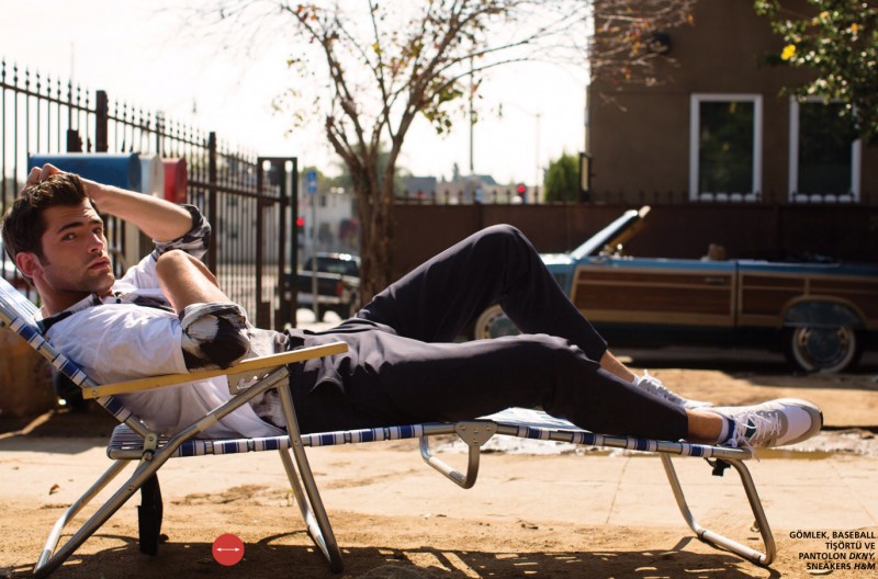 Sean O'Pry catches a moment to relax in a look from DKNY with H&M sneakers.