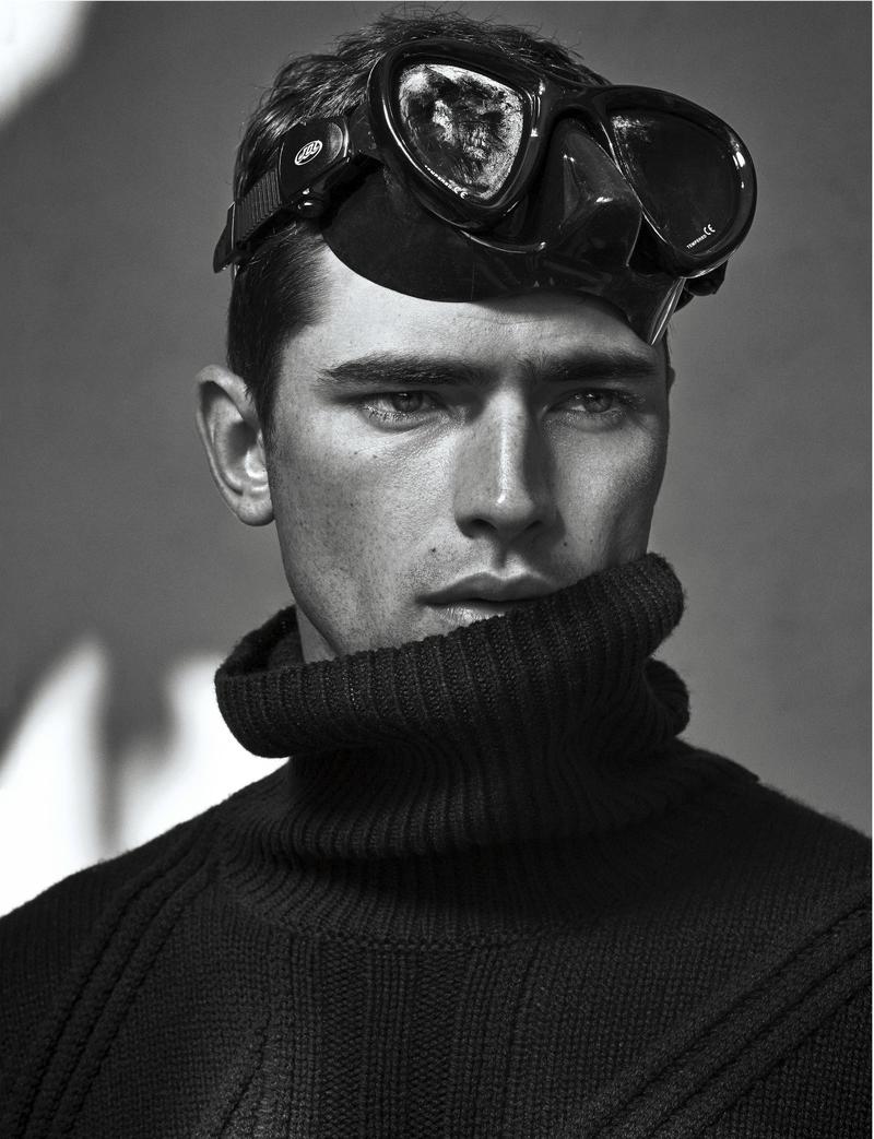 Sean O'Pry delivers a striking close-up in a sculpted turtleneck. 