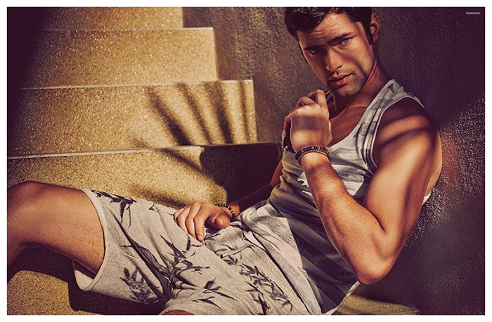 Sean O'Pry embraces relaxed summer styles in a tank and sweat shorts.