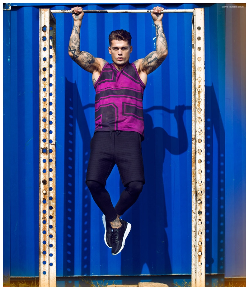 Stephen James shows off with a pull-up.