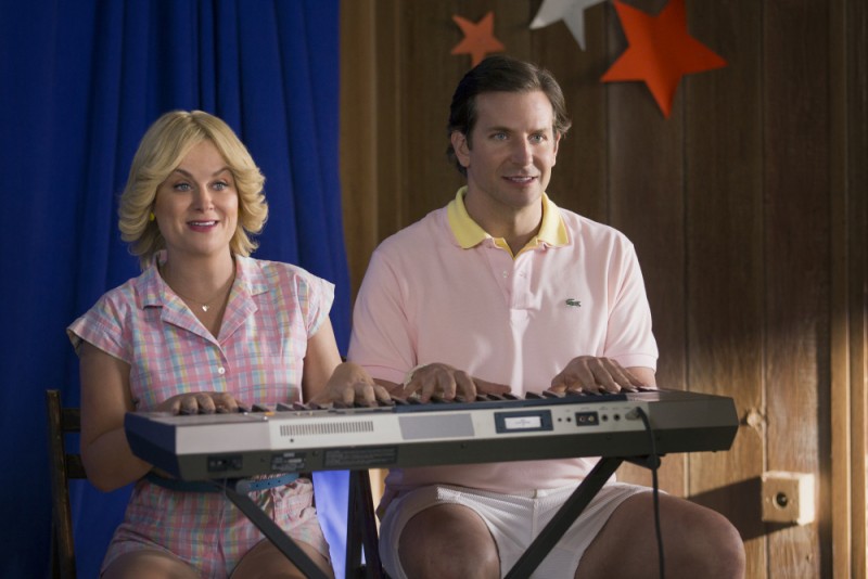 Amy Poehler and Bradley Cooper in Wet Hot American Summer (2015).