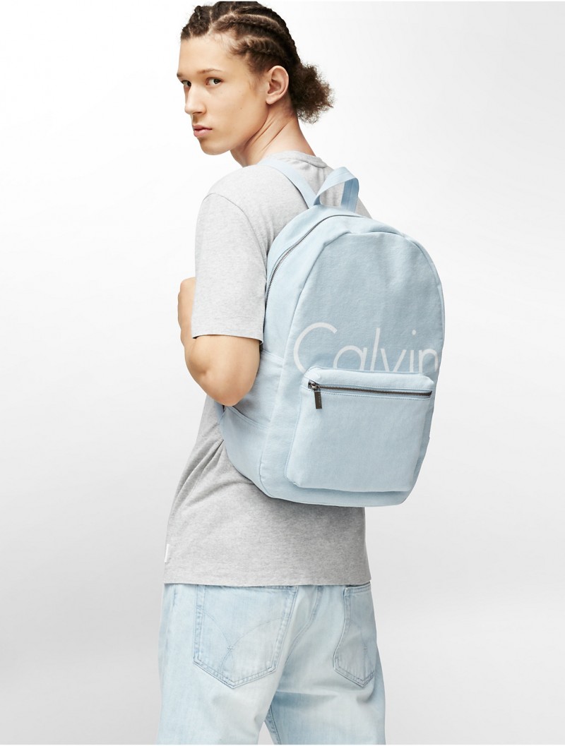 Abiah wears a logo backpack.