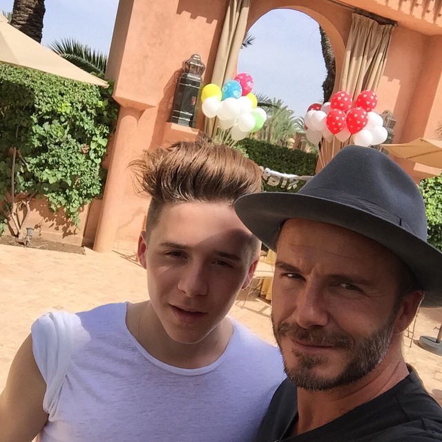 David Beckham poses for a selfie with his oldest son Brooklyn.