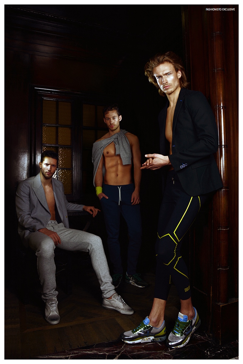 Left to Right: Elia wears all clothes Ermanno Scervino. Maximilian wears sweatshirt New Era, sweatpants Le Coq Sportive, armband Lotto and sneakers Premiata. Stefan wears sneakers Premiata, jacket and jumpsuit Dirk Bikkembergs.